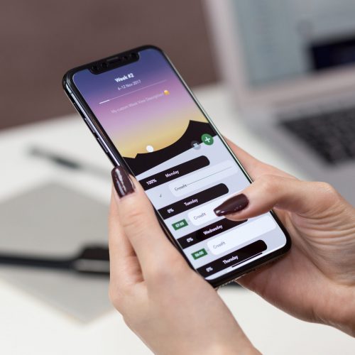 person-holding-a-smartphone-892757 person-holding-a-smartphone-892757