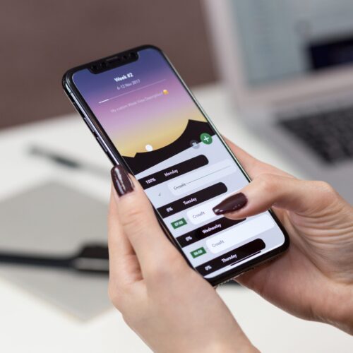 person-holding-a-smartphone-892757 person-holding-a-smartphone-892757